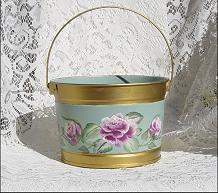 full view of green bucket with roses trimmed in gold
